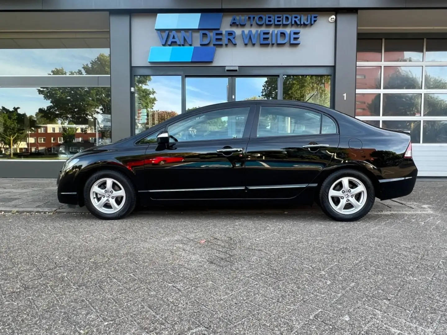 Honda Civic 1.3 HYBRID ELEGANCE   NAP  CLIMA  NAV  Origineel N Zwart - 1