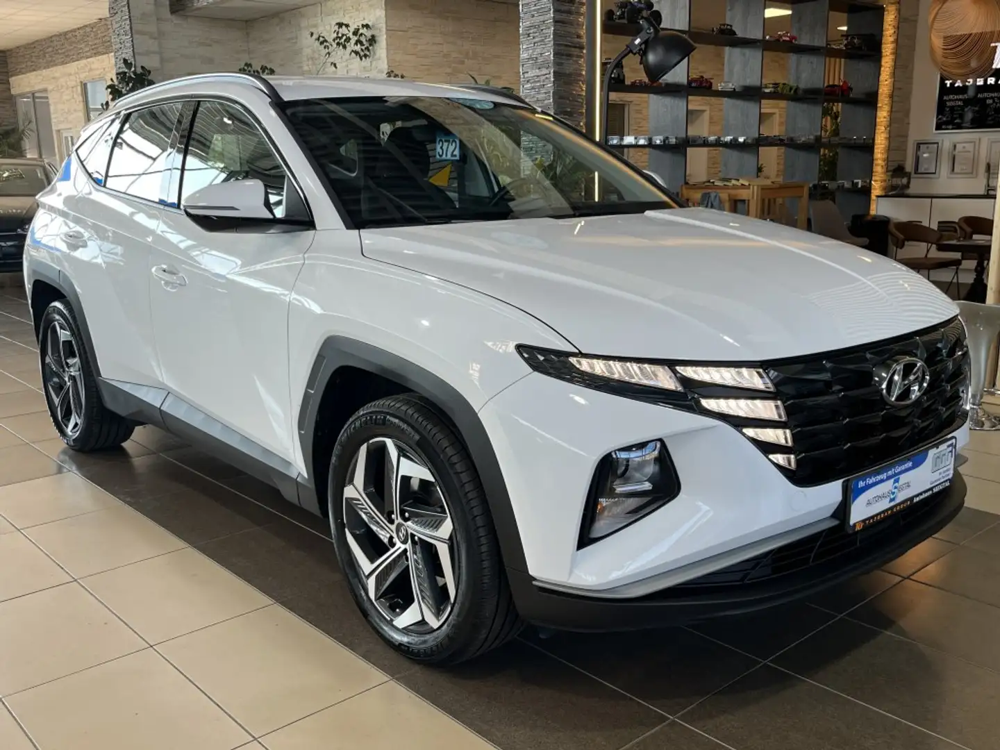 Hyundai TUCSON Plug-In Hybrid 4WD Cockpit Navi R.Cam SHZ Weiß - 1