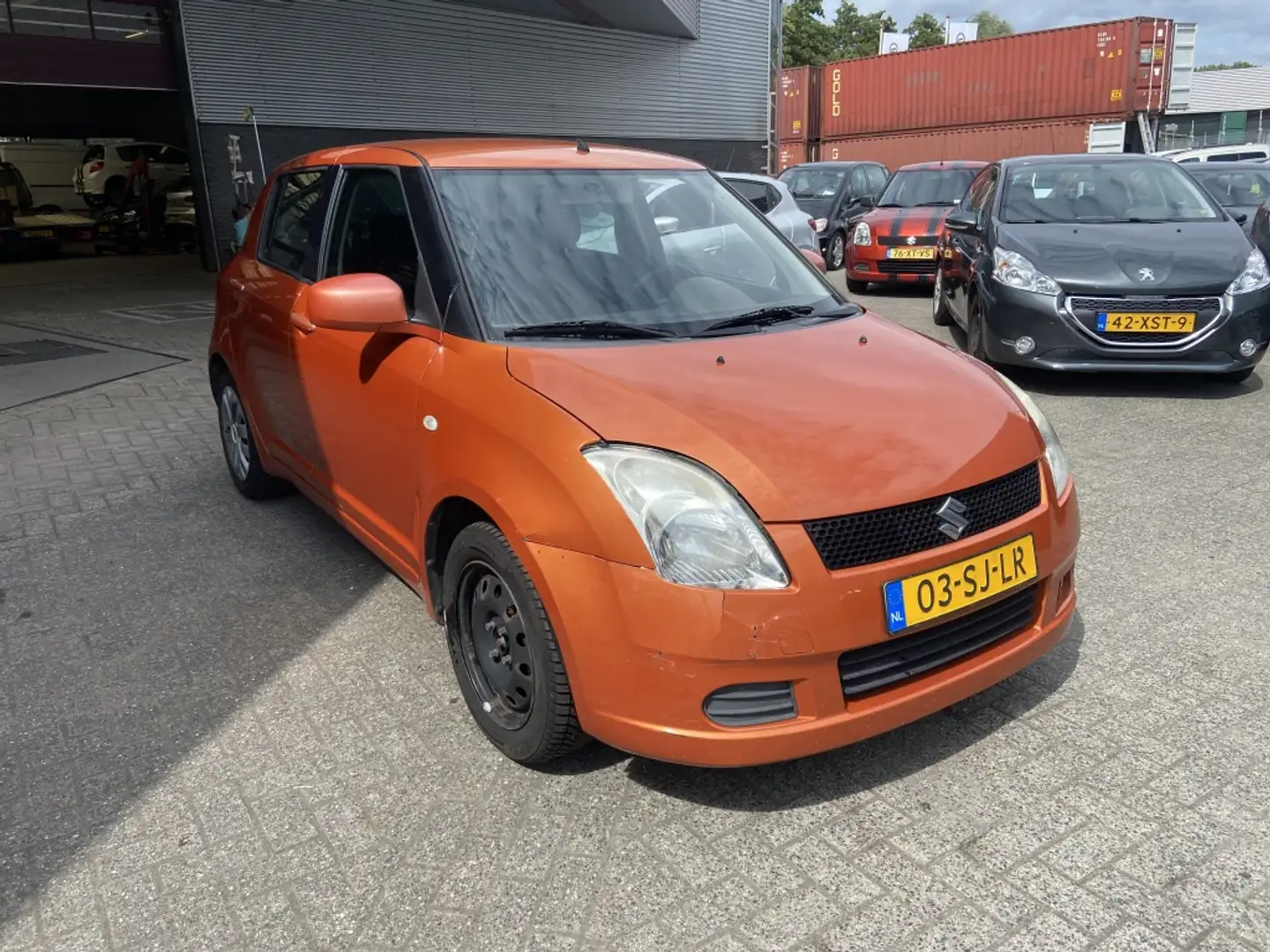 Suzuki Swift 1.3 GLS Oranje - 1