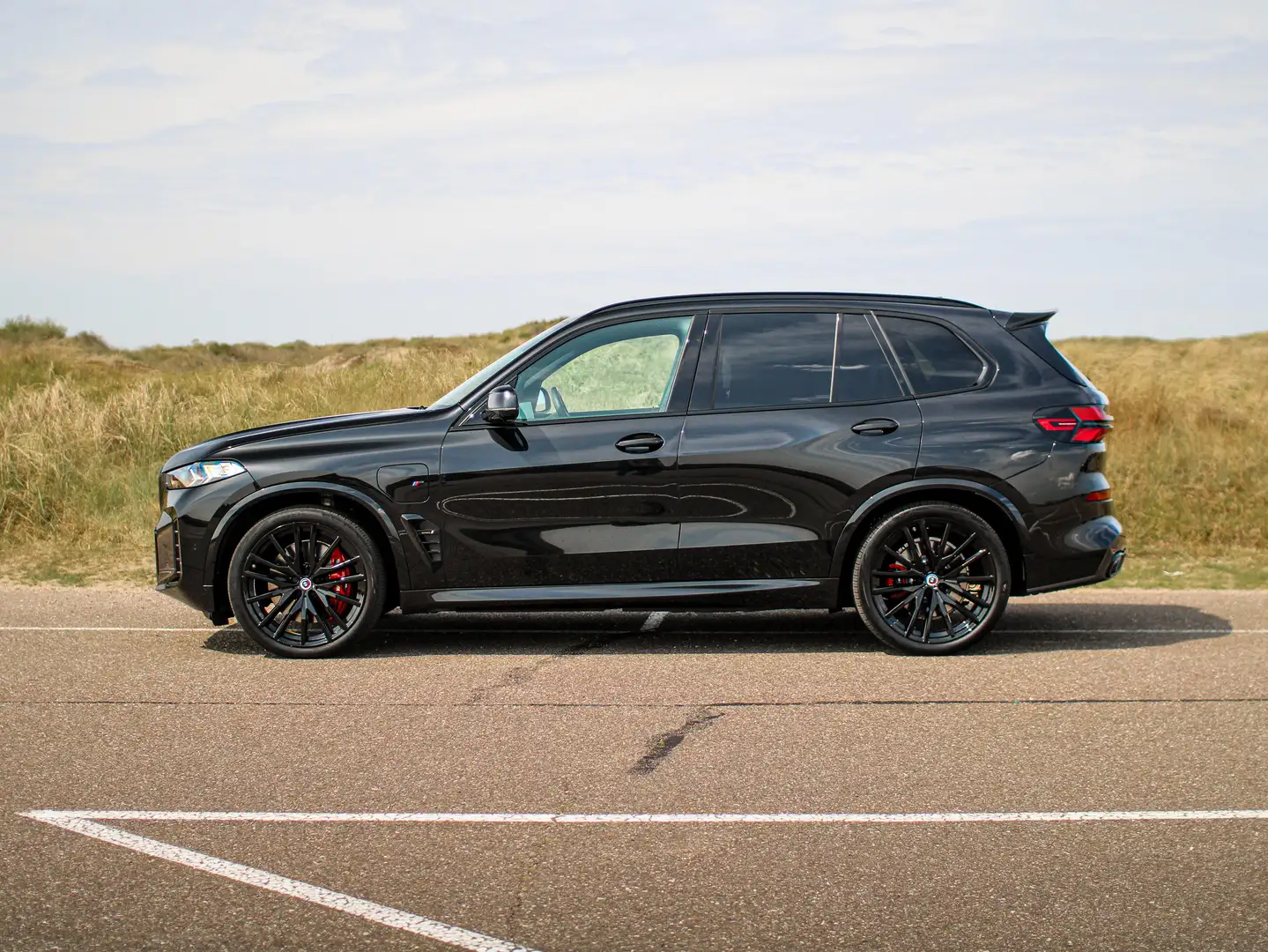 BMW X5 xDrive50e | Hybrid | Pano | Trekhaak | M Pro | LED Zwart - 1