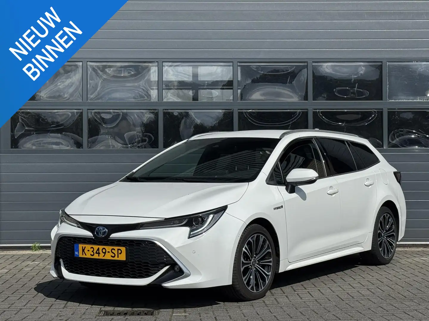 Toyota Corolla TOURING SPORTS 1.8 HYBRID EXECUTIVE I AUTOMAAT I A Wit - 1