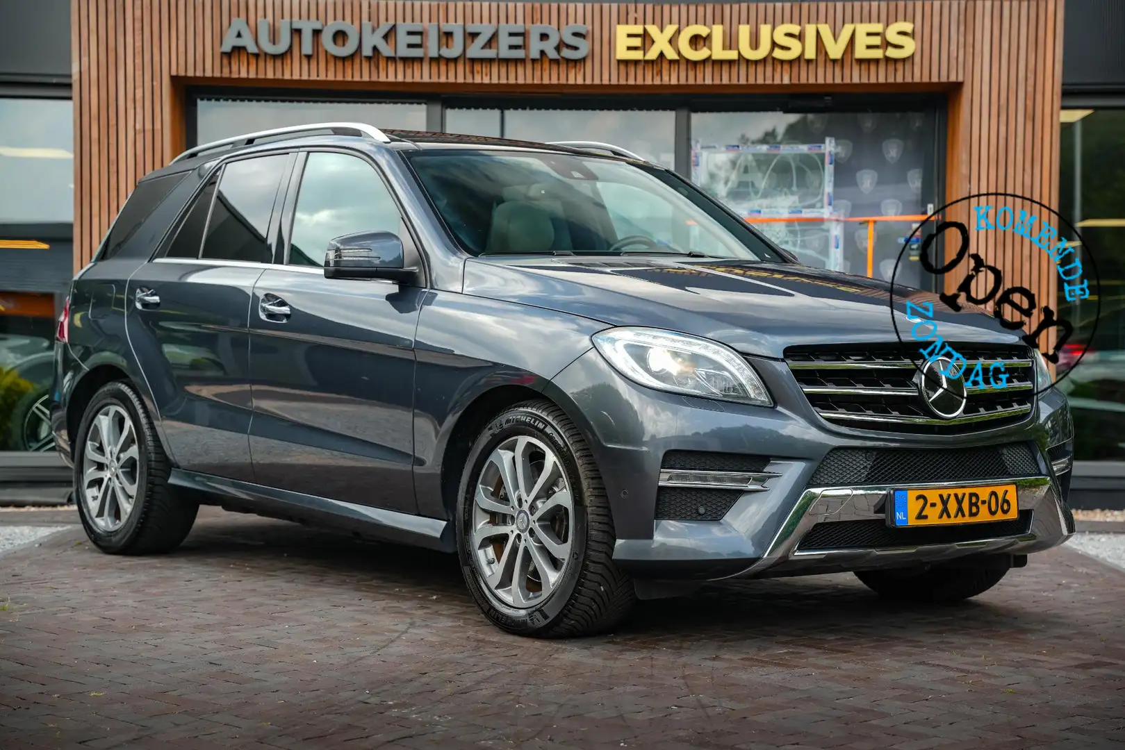 Mercedes-Benz ML 500 M-klasse AMG Panoramadak Adapt. Cruise Camera Leer Серый - 1