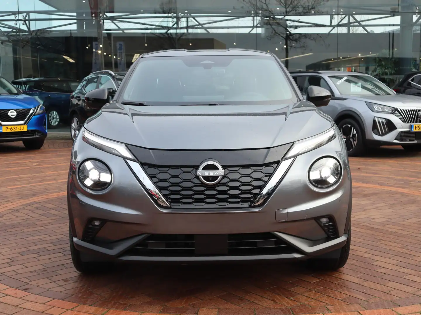 Nissan Juke 1.6 Hybrid Tekna | Lederen Bekl. | BOSE Audio | Ad Grijs - 2