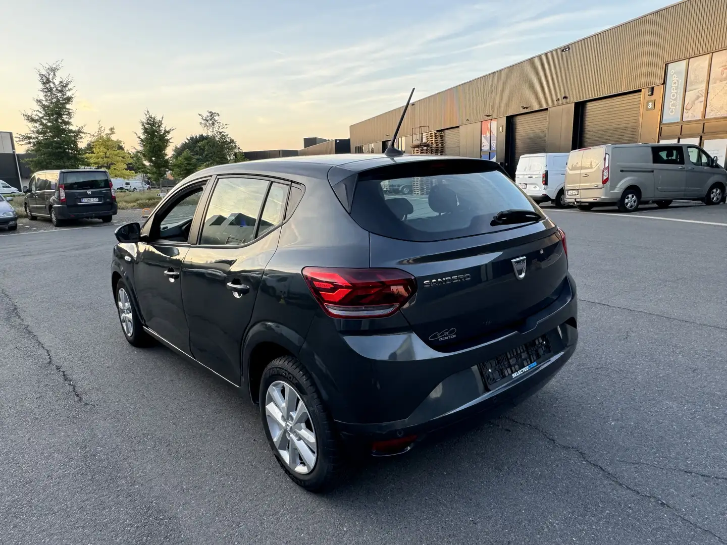 Dacia Sandero SCe Essential Full option Carplay / Camera Gris - 1