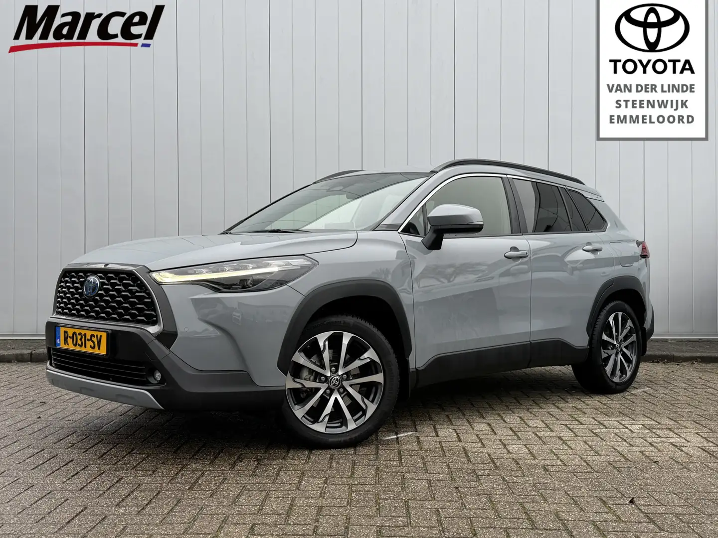 Toyota Corolla Cross 2.0 High Power Hybrid First Edition NL Auto 1 Eige Grijs - 1