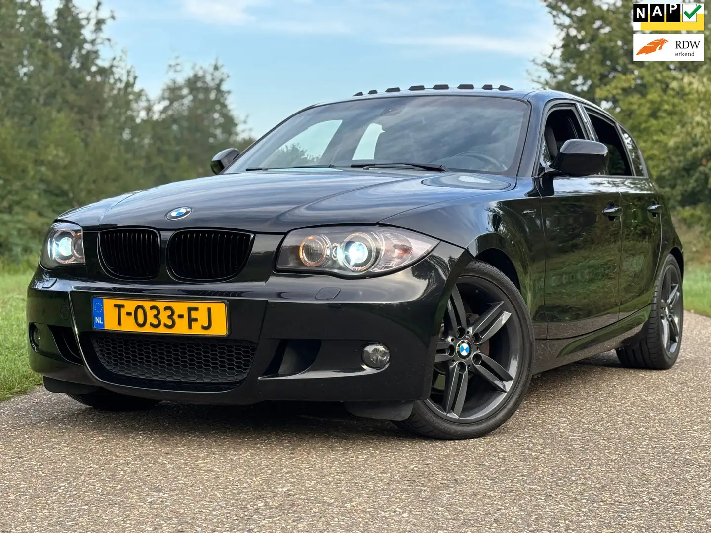 BMW 118 1-serie 118i EffDyn. Ed. Bus Line Ultimate Edit M- Zwart - 1