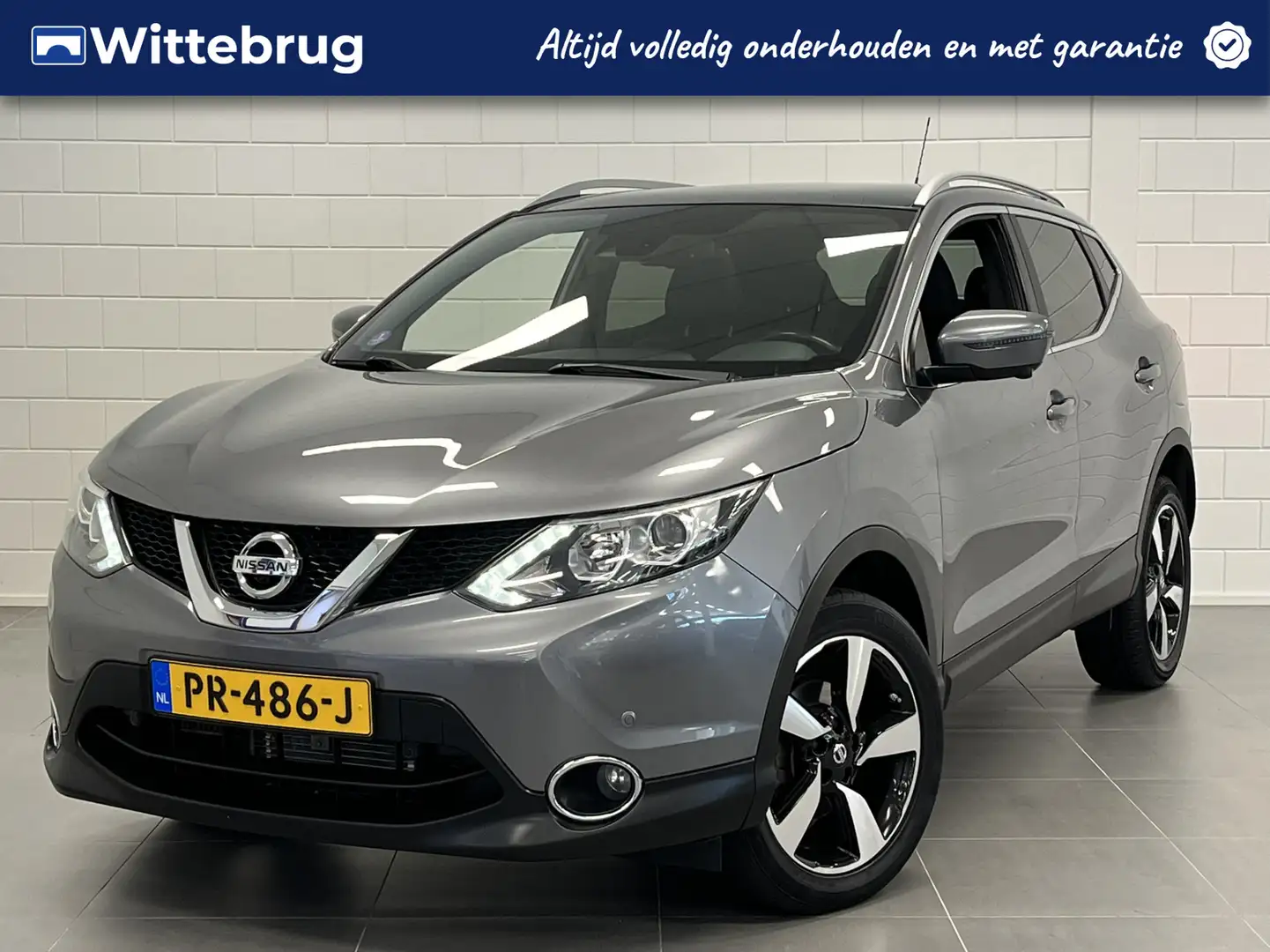 Nissan Qashqai 1.2 N-Vision TREKHAAK | PANORAMADAK | NAVIGATIE | Grijs - 1