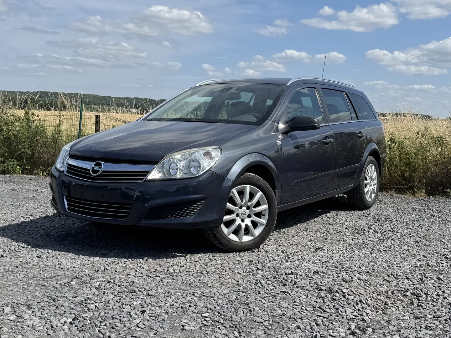 Opel Astra SW 1.7 CDTi Cosmo Grijs - 1