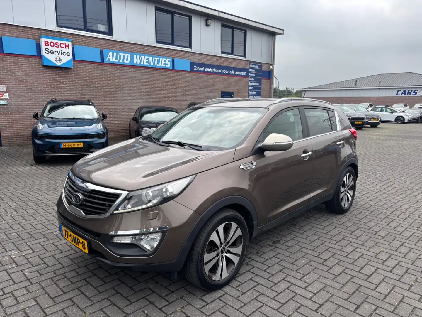 Kia Sportage 1.7 CRDI 85kw | X-clusive | Leer | Navi Marrón - 2