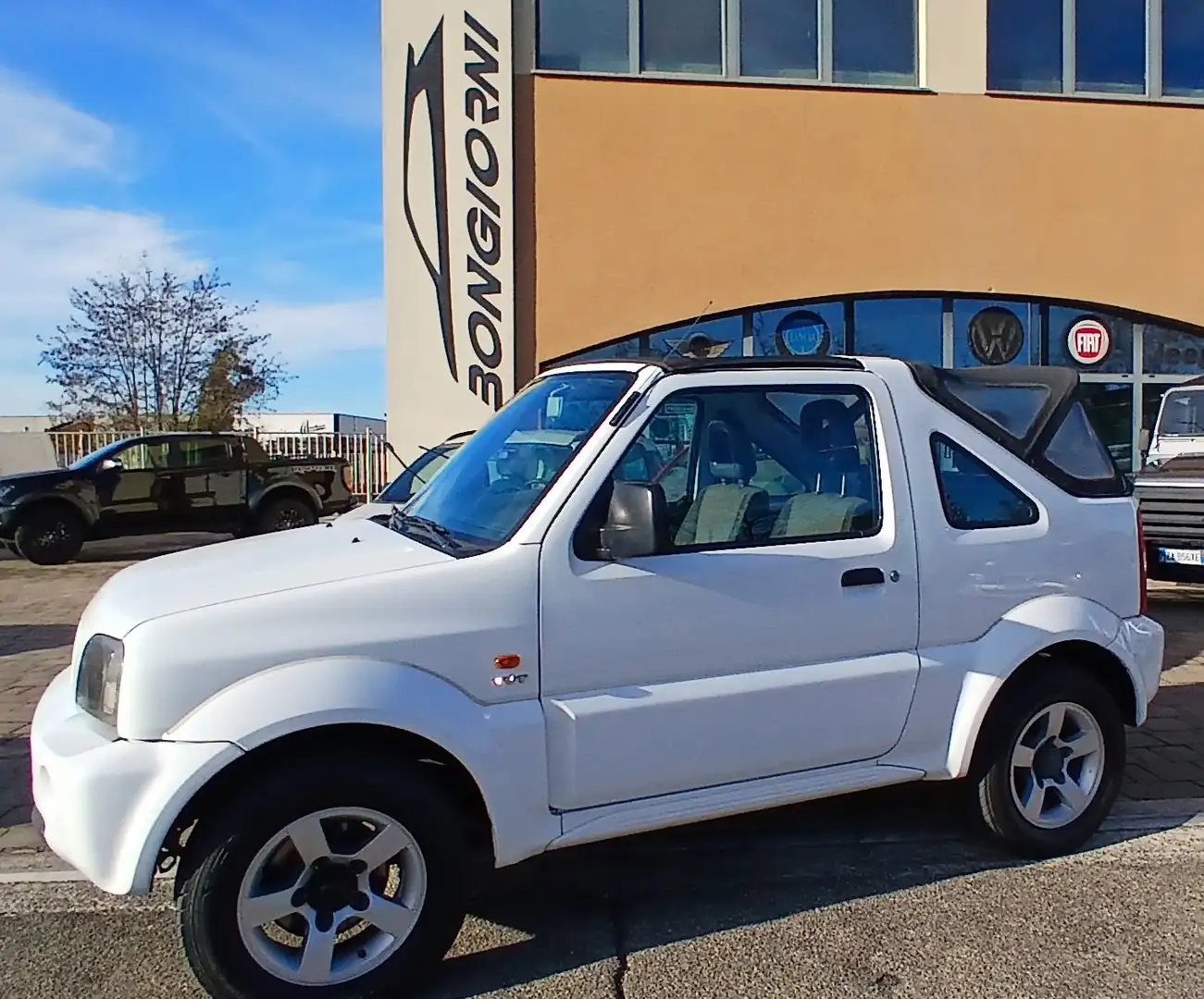 Suzuki Jimny cabrio 1,3 benzina con CLIMA introvabile Bianco - 1