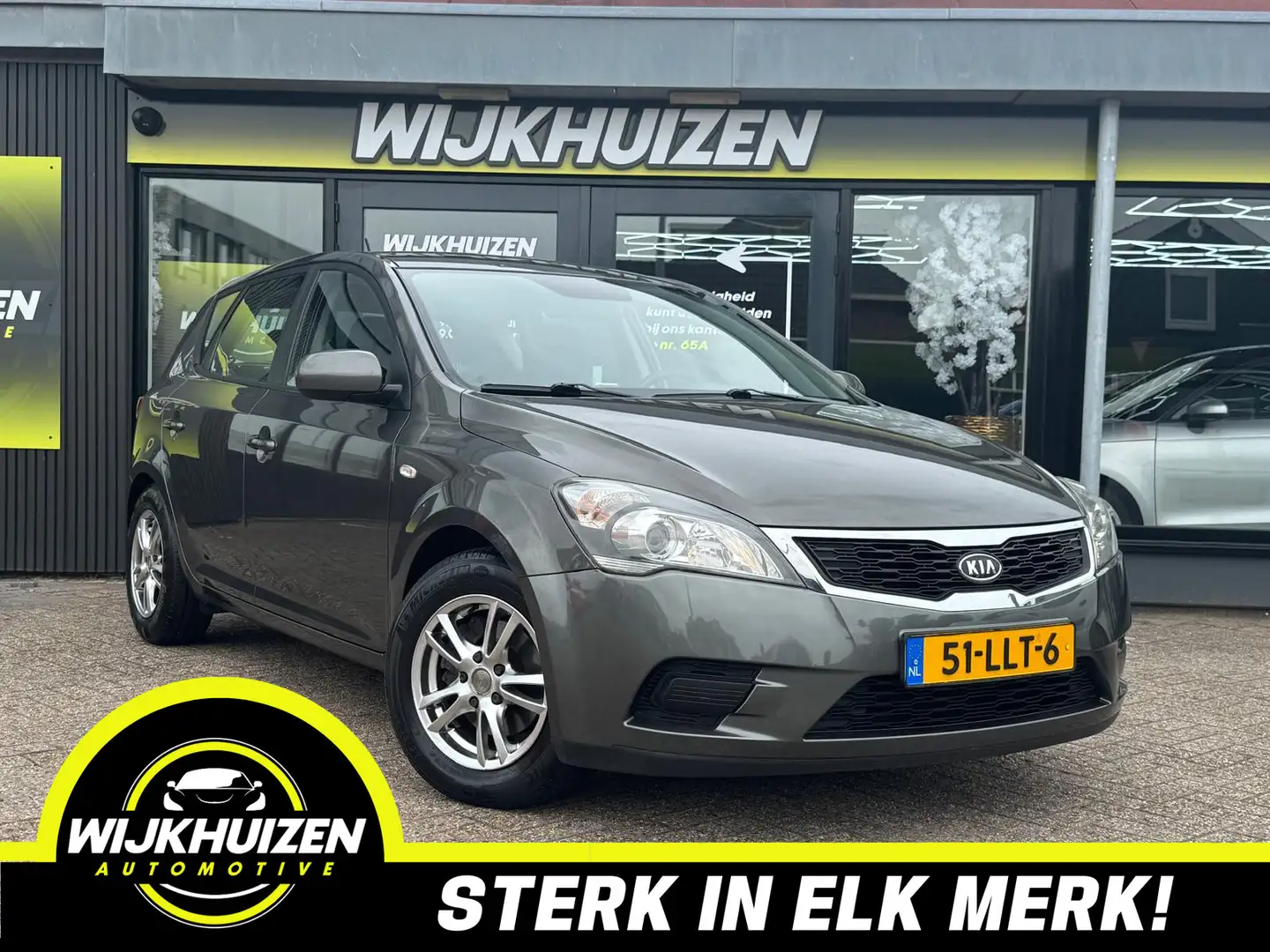 Kia Ceed / cee'd 1.4 CVVT X-tra met Airco !!! Cruise !!! Dealer Ond Grijs - 1