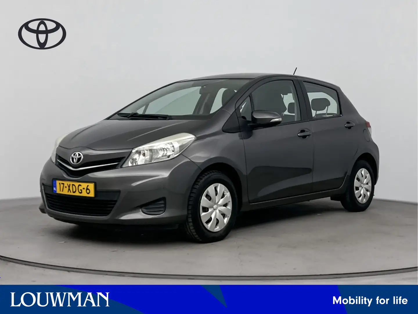 Toyota Yaris 1.0 VVT-i Aspiration | Navigatie | Camera | Ledere Grigio - 1