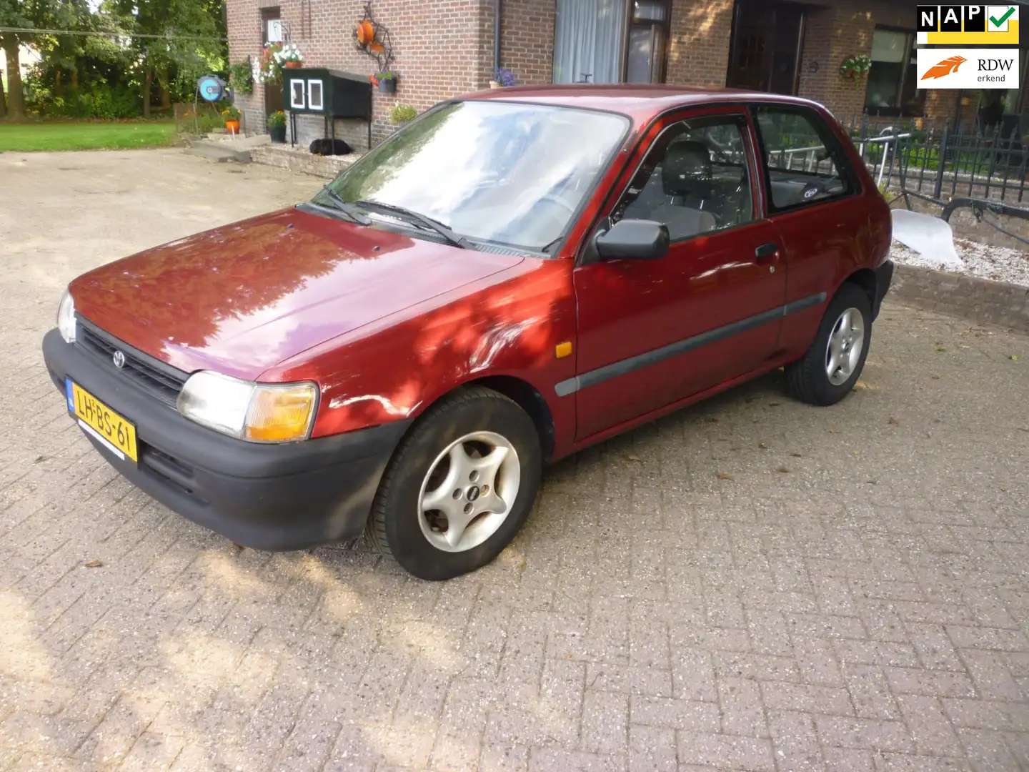 Toyota Starlet 1.3i (AUTOMAAT) Rood - 1