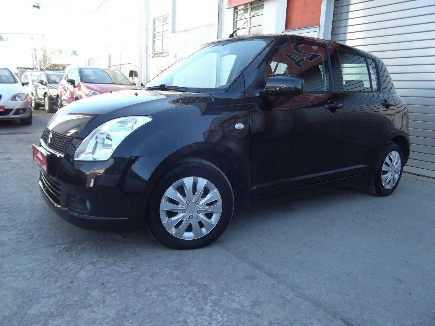 Suzuki Swift Lim. Dance Comfort Schwarz - 1