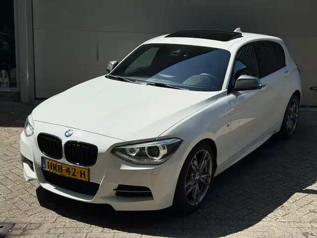 BMW 135 1-serie M135i xDrive High Executive l Schuifdak l