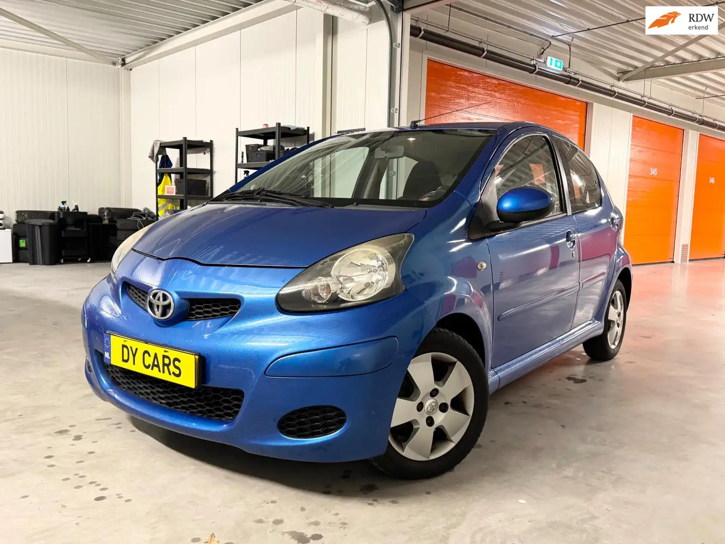 Toyota Aygo 1.0-12V Access | Zo goed als nieuw | Rijd & Schake Blauw - 1