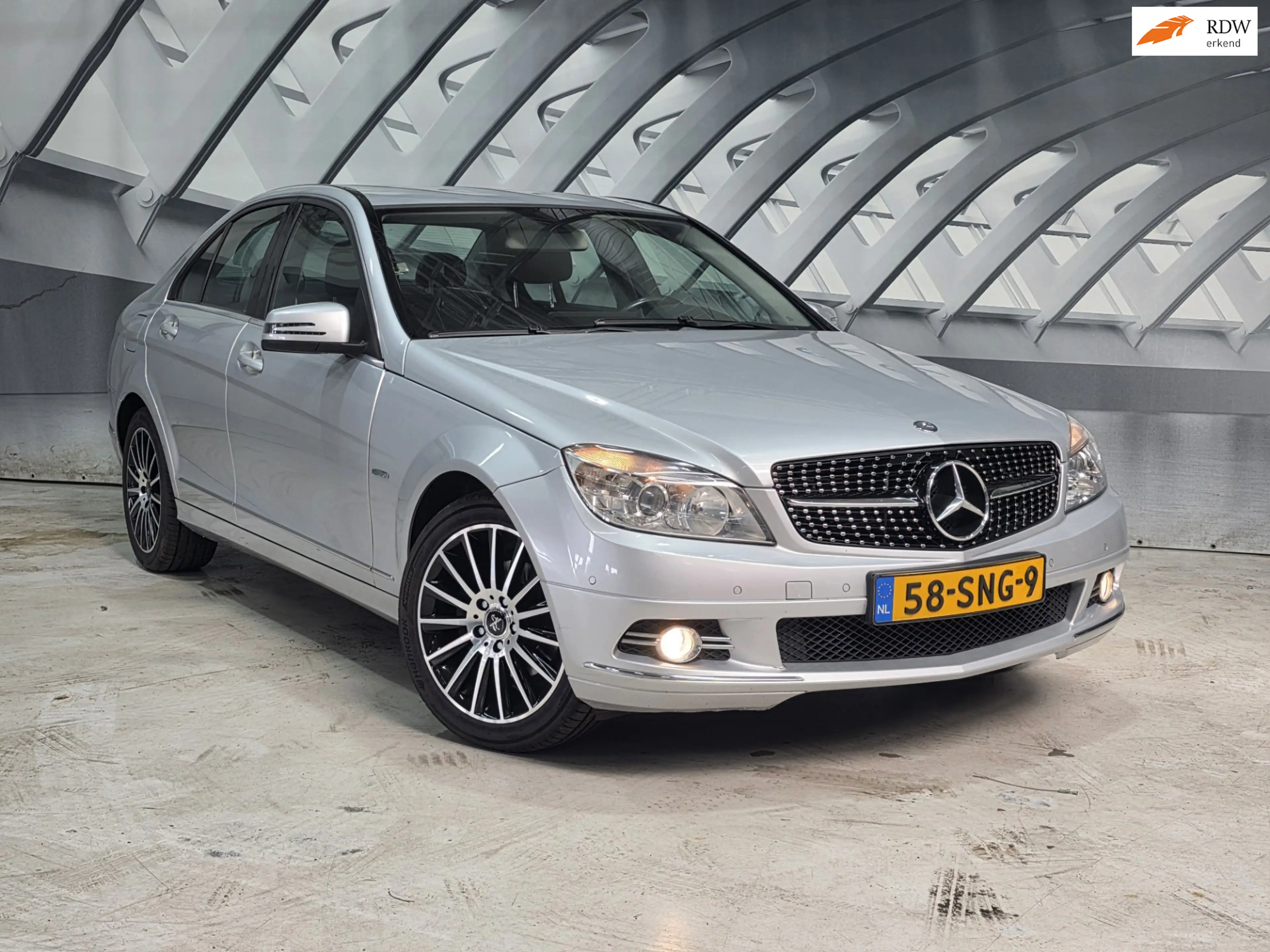 Mercedes-Benz C 180 CGI Avantgarde business Class half leer