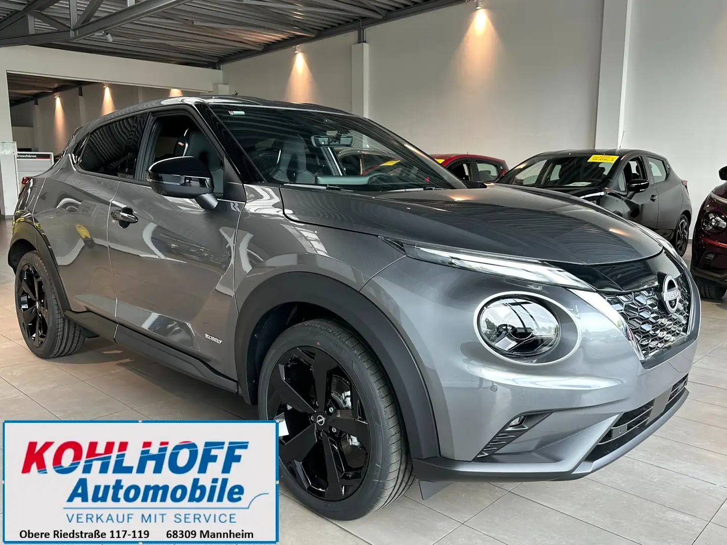 Nissan Juke Nissan Juke 1.6 Hybrid 143PS Tekna Automatik BOSE Grijs - 1