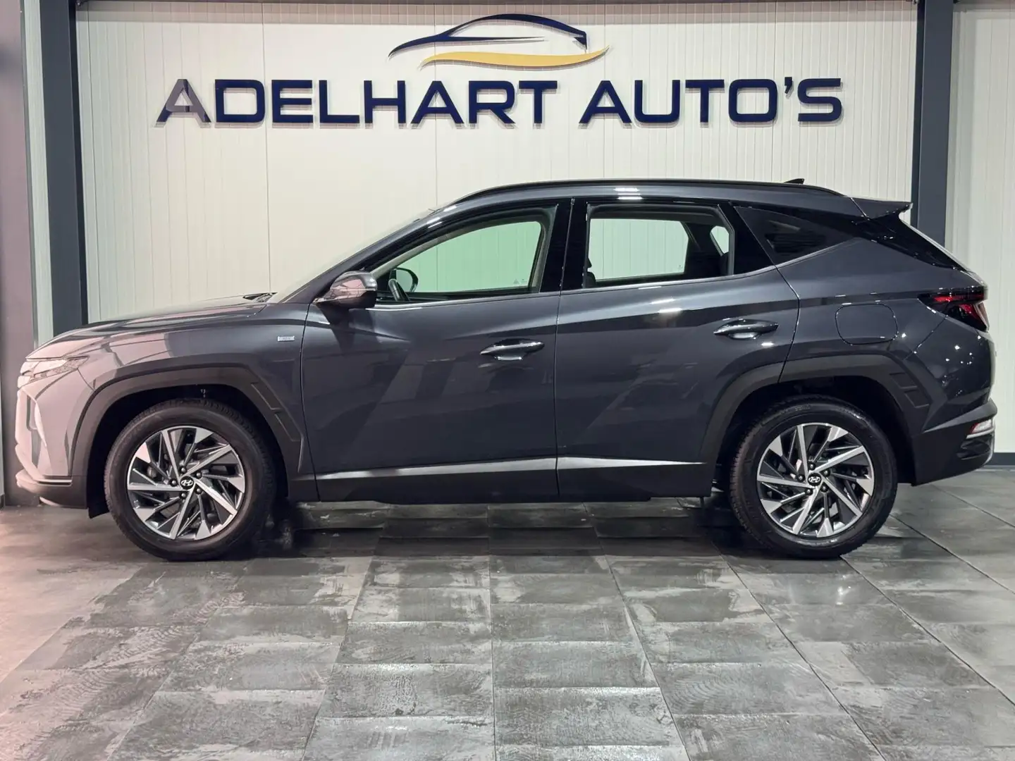 Hyundai TUCSON 1.6 T-GDI MHEV Comfort Automaat / Navigatie full m Grijs - 2