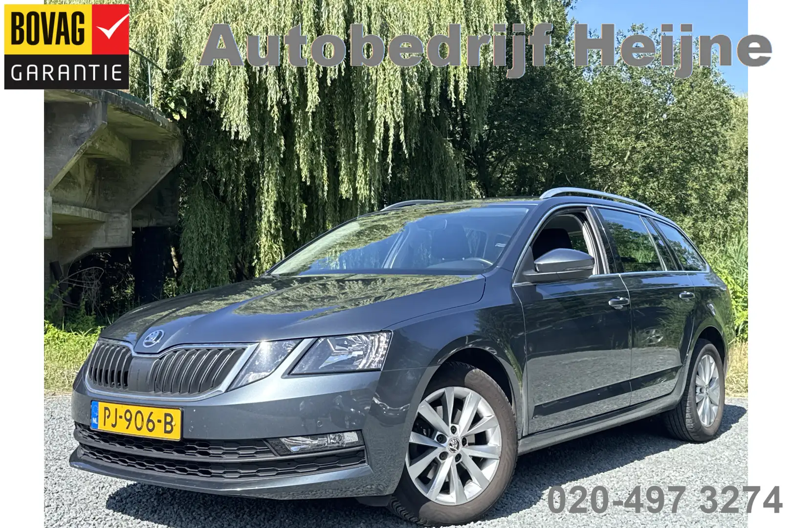 Skoda Octavia Combi TSI AMBITION BUSINESS TREKHAAK/CAMERA/NAVI/A Grijs - 1