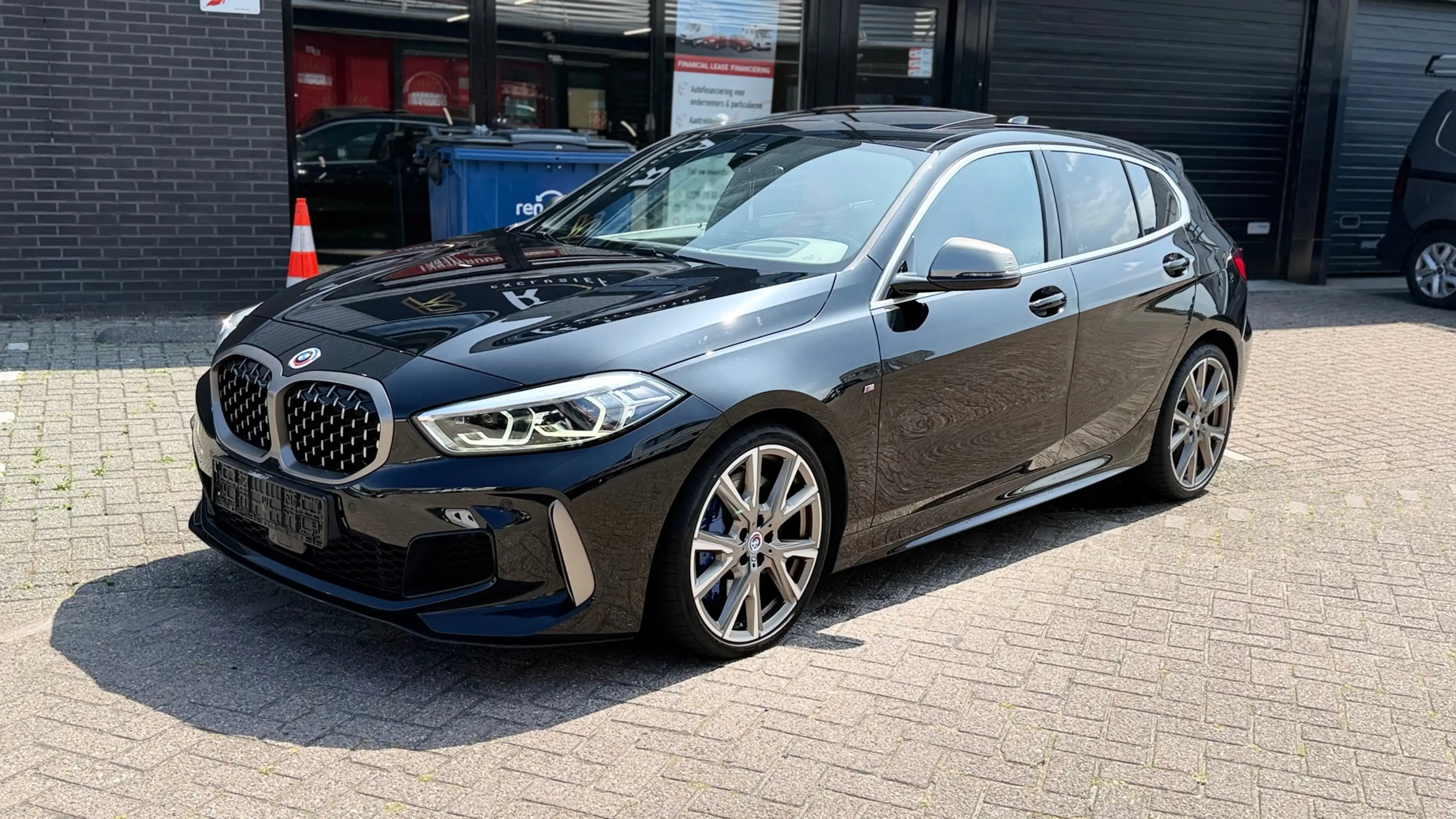 BMW 135 1-serie M135i xDrive High Executive — photo 2