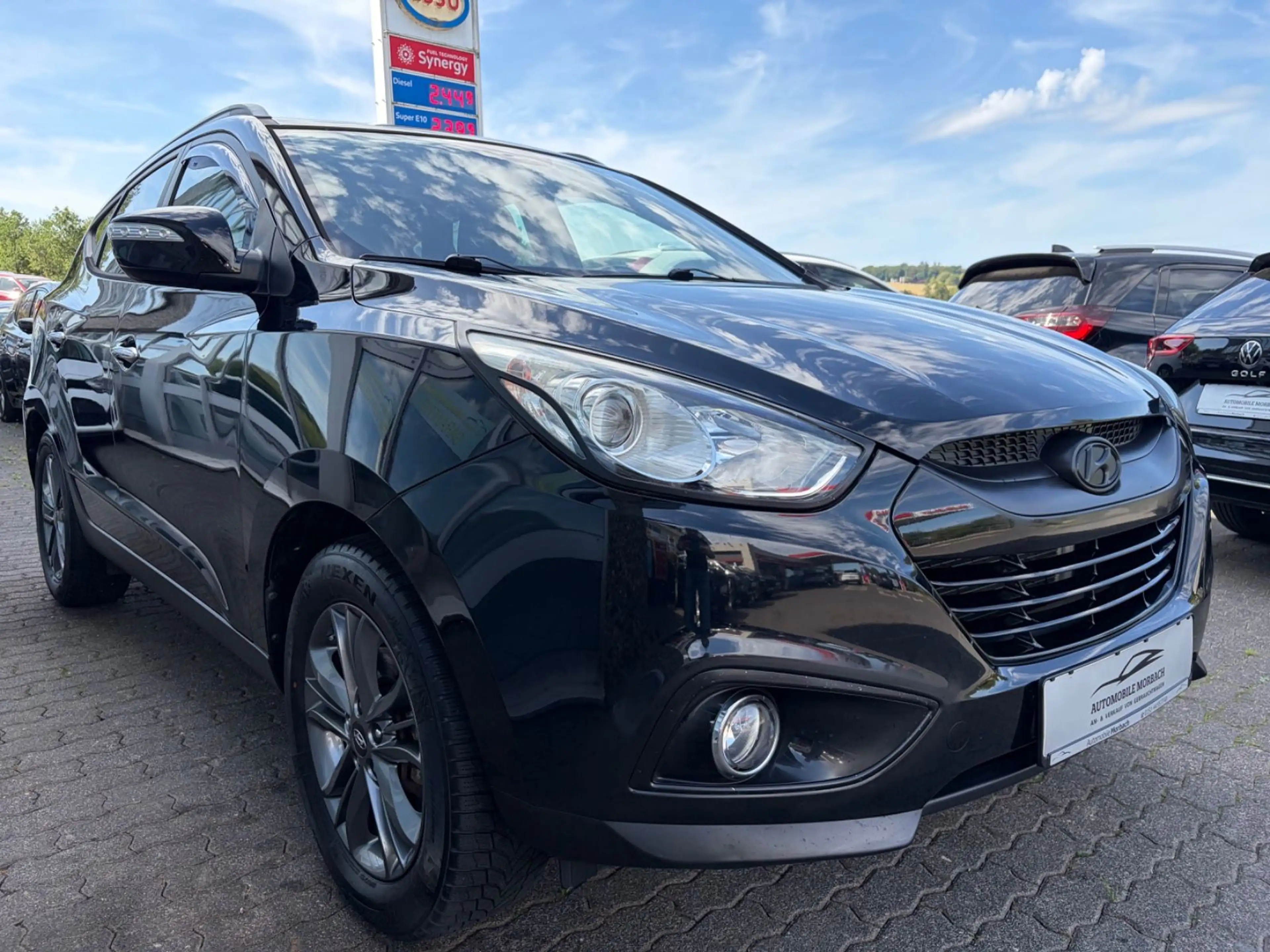 Hyundai iX35 2.0 CRDi Style 4WD*NAVI*R-CAM*ALU*AHK*TEMPO — photo 2