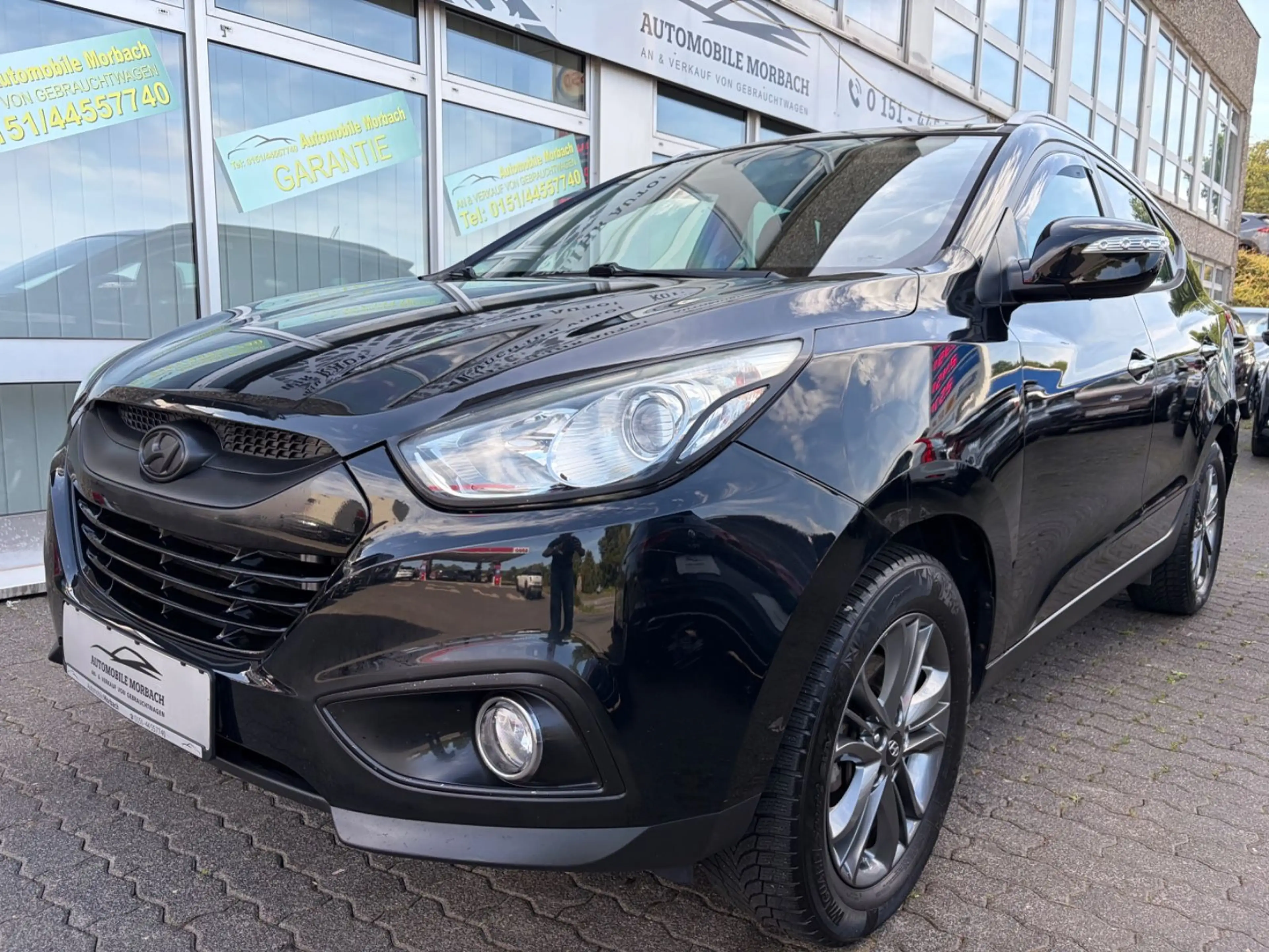 Hyundai iX35 2.0 CRDi Style 4WD*NAVI*R-CAM*ALU*AHK*TEMPO — photo 4