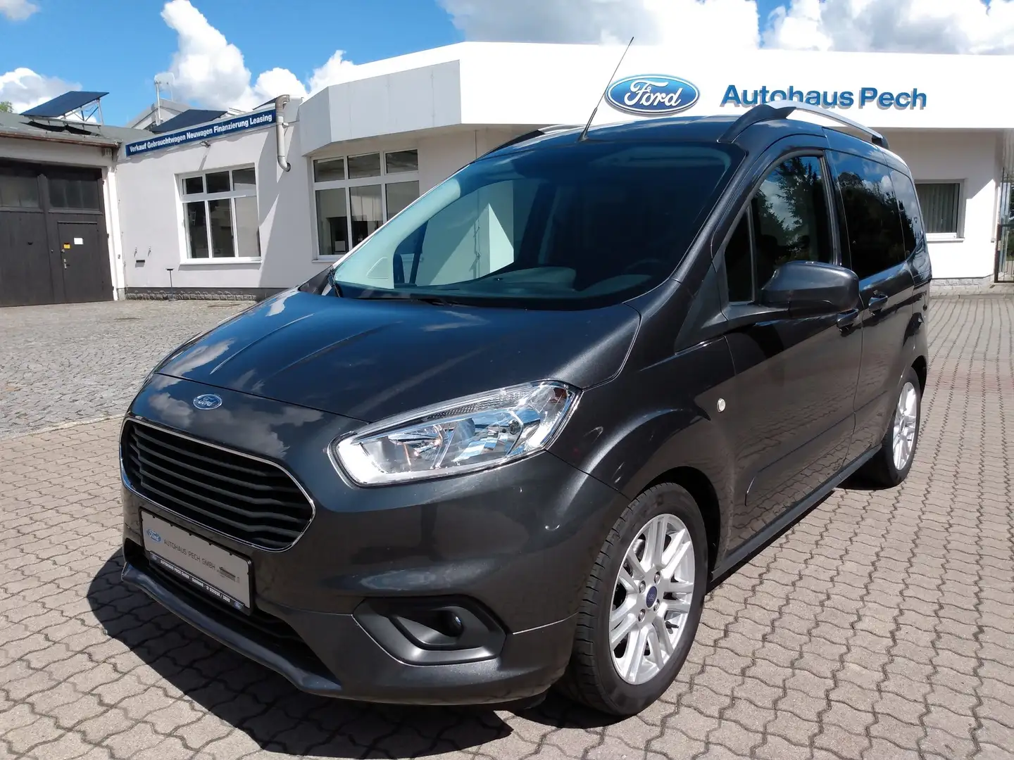 Ford Tourneo Courier Titanium - Navi*Winterpaket*RFK*Tempomat*Garantie Gris - 1