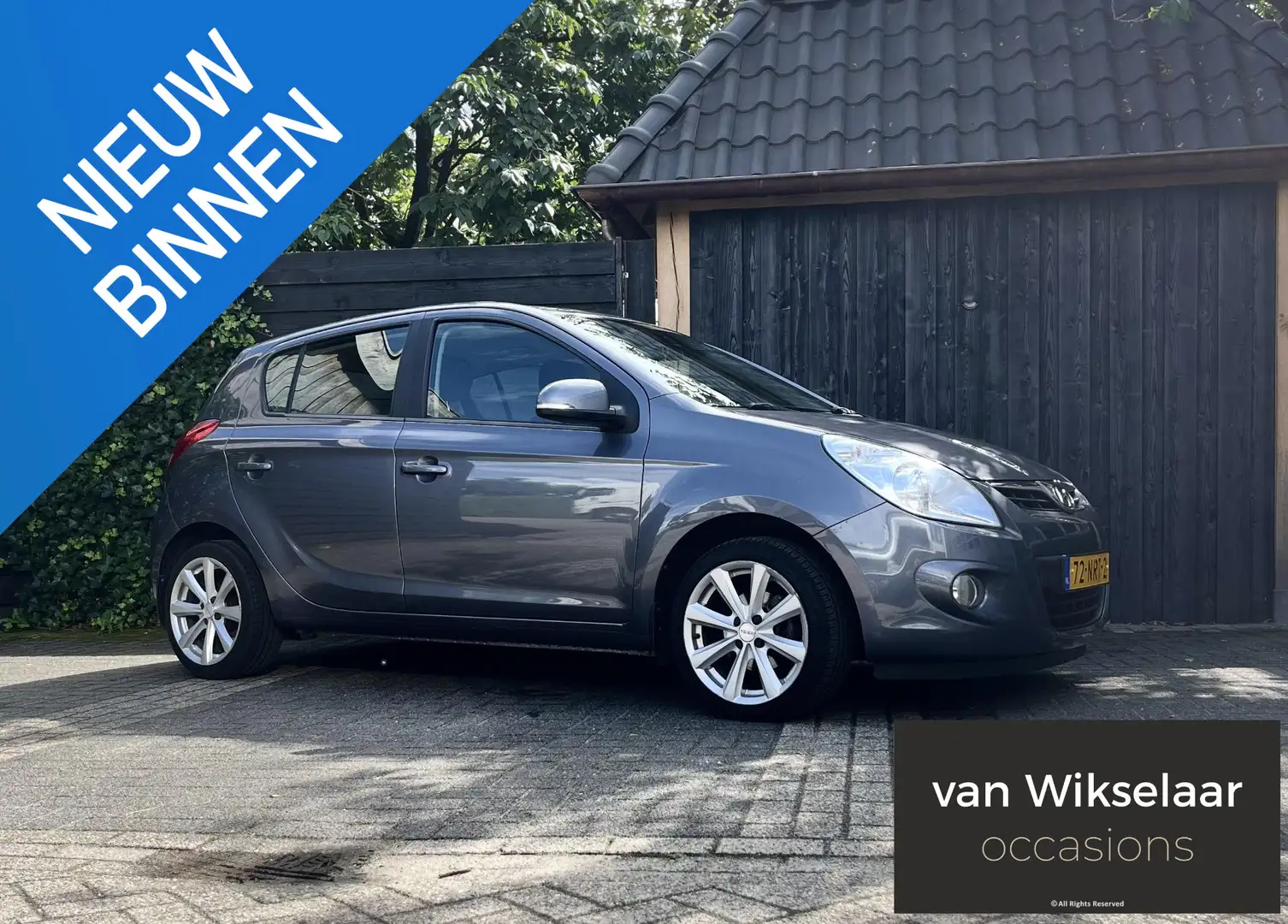 Hyundai i20 1.4i i-Motion AUTOMAAT 2010 - DEALERONDERHOUDEN Grijs - 1