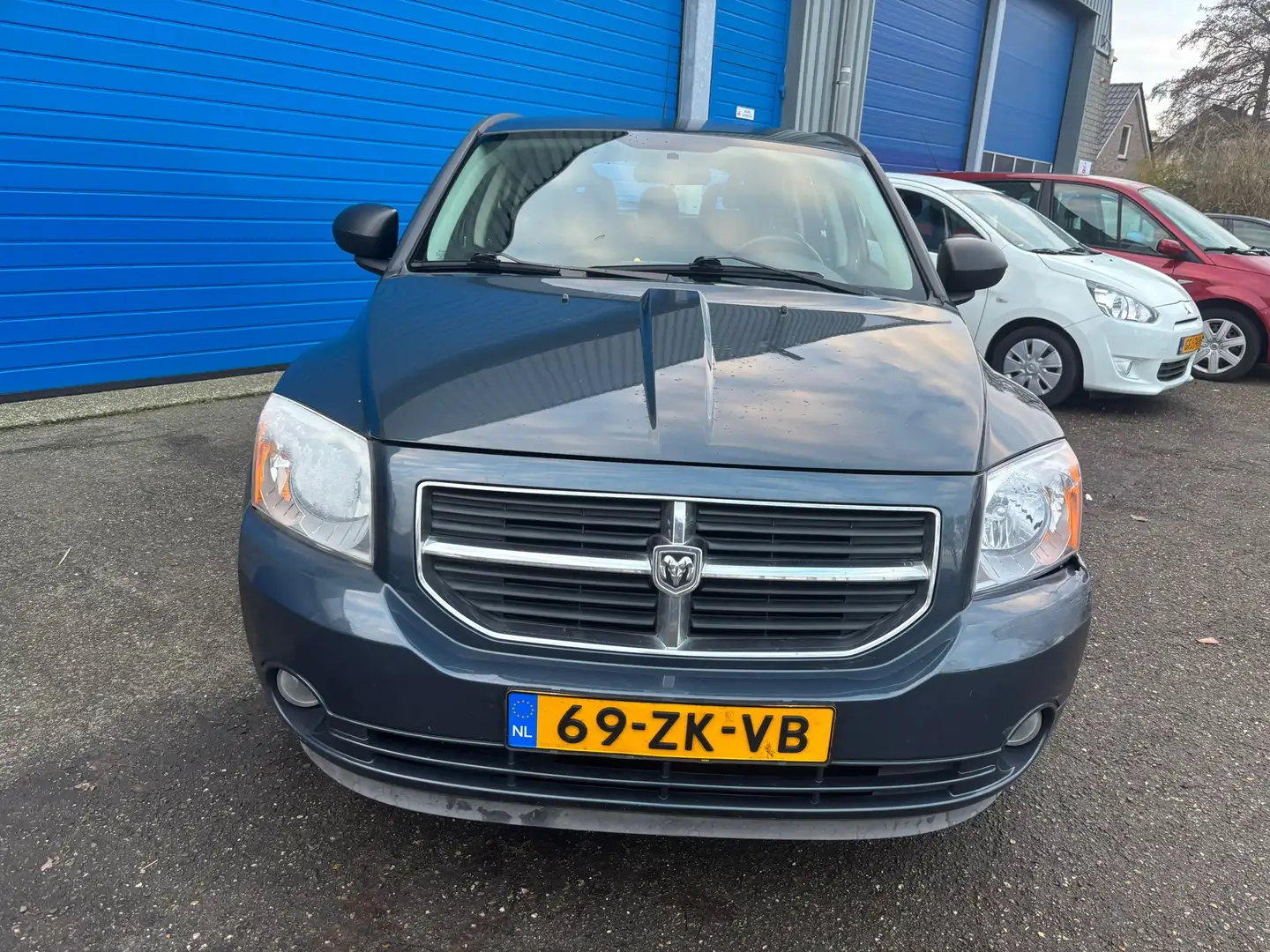 Dodge Caliber 1.8 SXT. Zij Schade met Airco Azul - 2