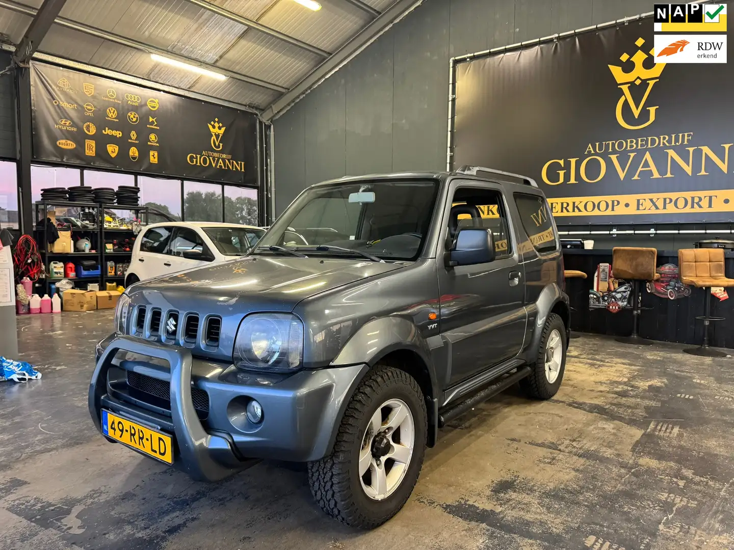 Suzuki Jimny 1.3 Exclusive inruilen is mogelijk Gris - 1