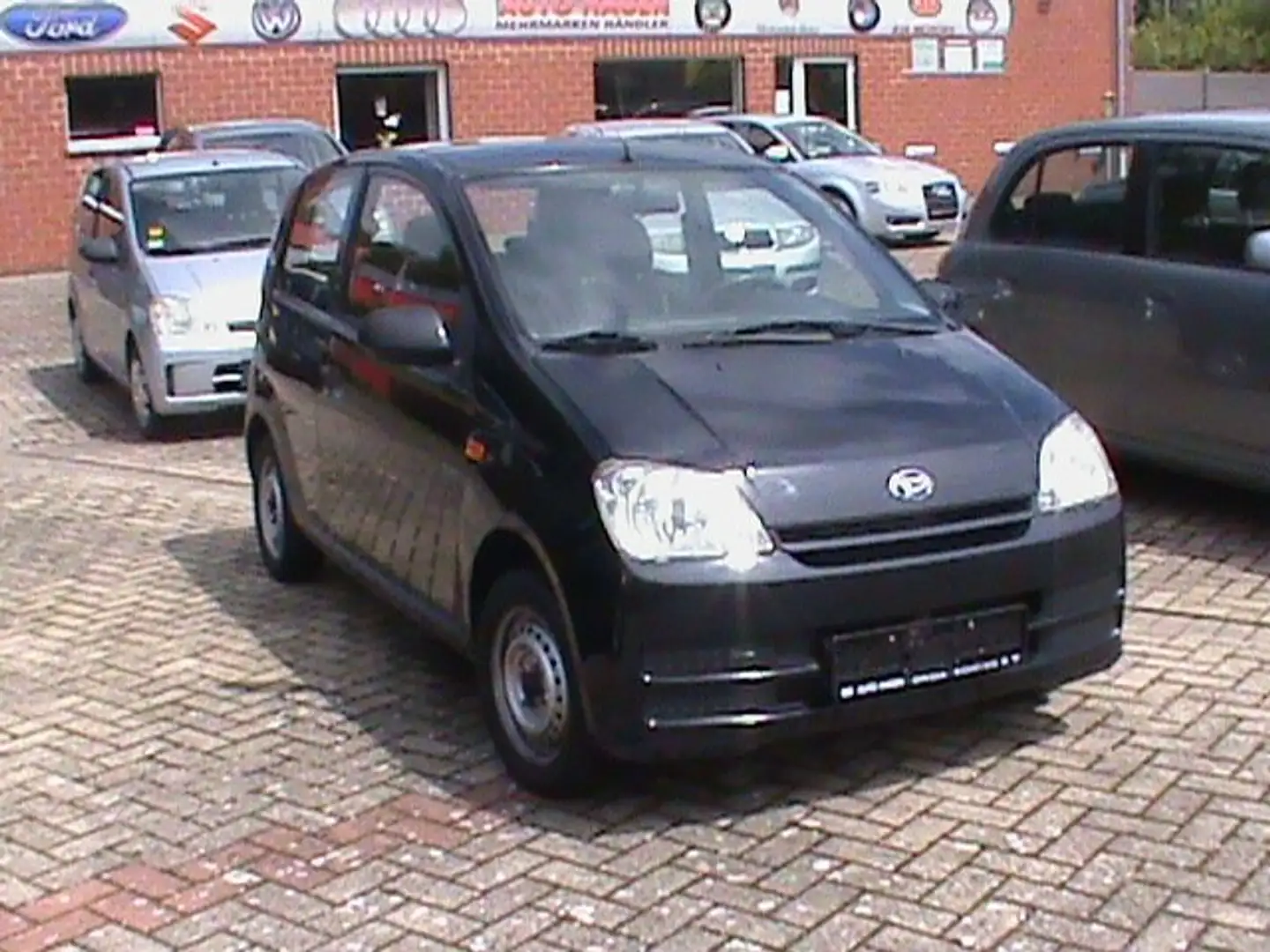 Daihatsu Cuore 1.0 Automatik Plus Schwarz - 1