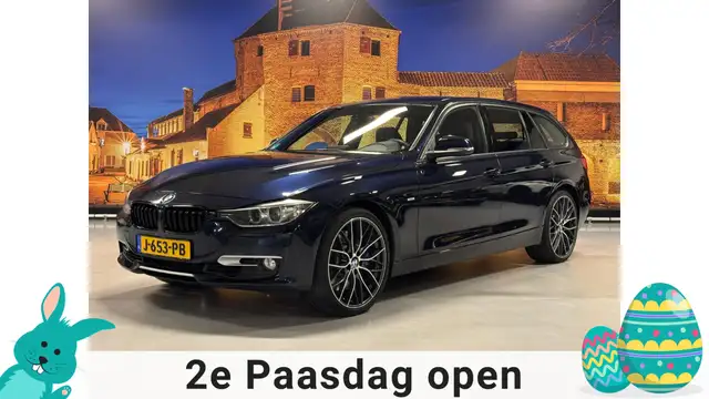 BMW 335 3-serie Touring 335i xDrive High Exe Aut Leer Came