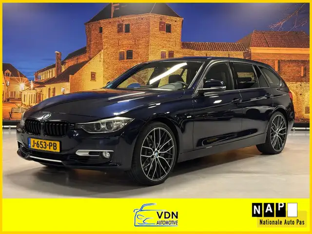 BMW 335 3-serie Touring 335i xDrive High Exe Aut Leer Came