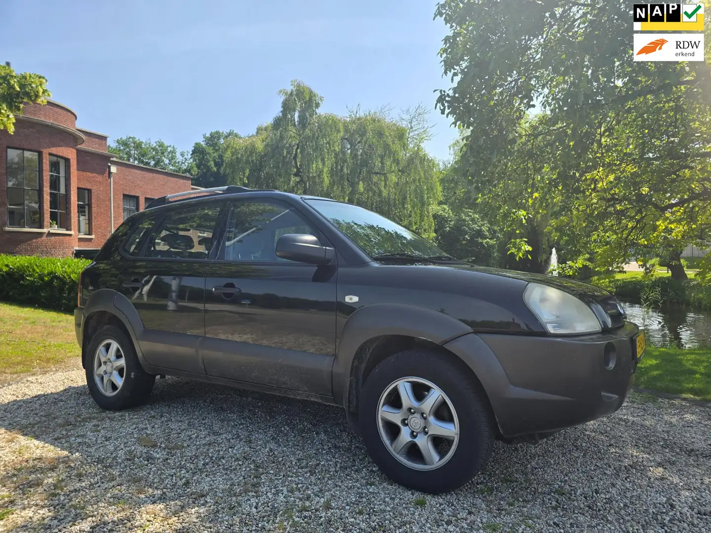 Hyundai TUCSON 2.0i Active AIRCO *apk:06-2025* Zwart - 1
