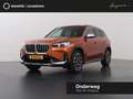 BMW X1 sDrive18i | X-Line | Panoramadak | Sportstoelen | Orange - thumbnail 1