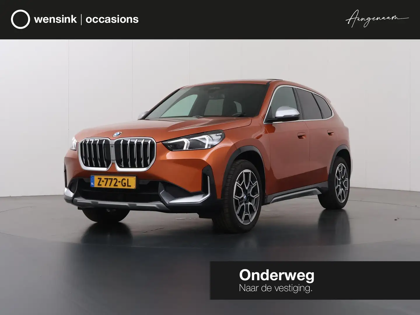 BMW X1 sDrive18i | X-Line | Panoramadak | Sportstoelen | Orange - 1