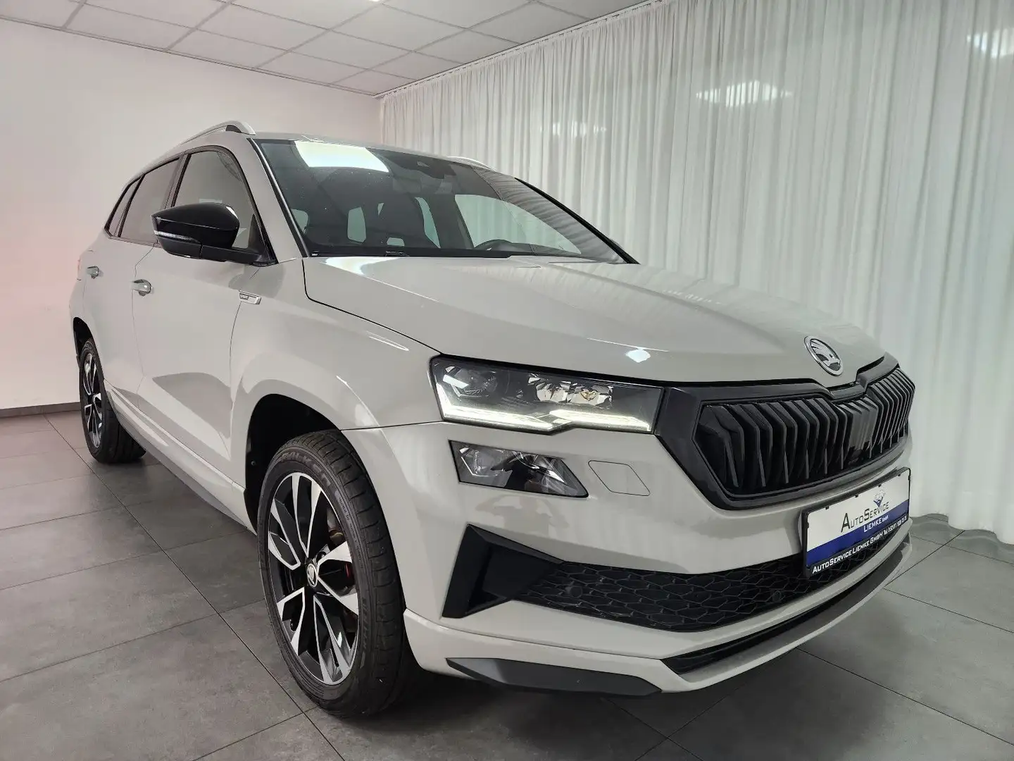 Skoda Karoq SPORTLINE 4x4 190PS LED NAV SHZ KAM CarPl. Gris - 1