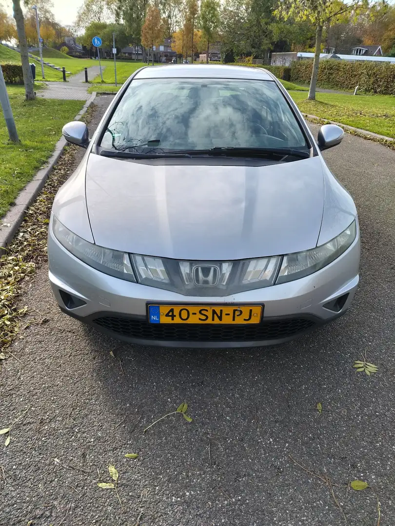Honda Civic 1.4i-DSi Comfort - 1