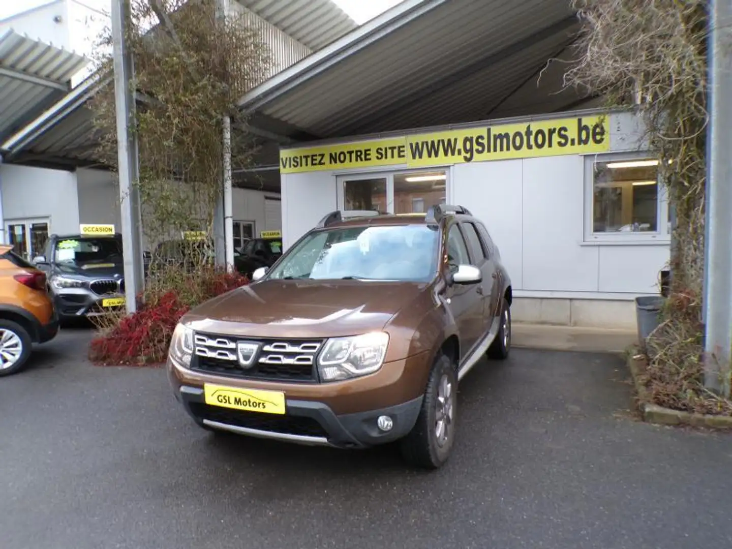 Dacia Duster 1.5 DCi 110cv brun 01/14 88.279km Airco GPS Cruise Brun - 1