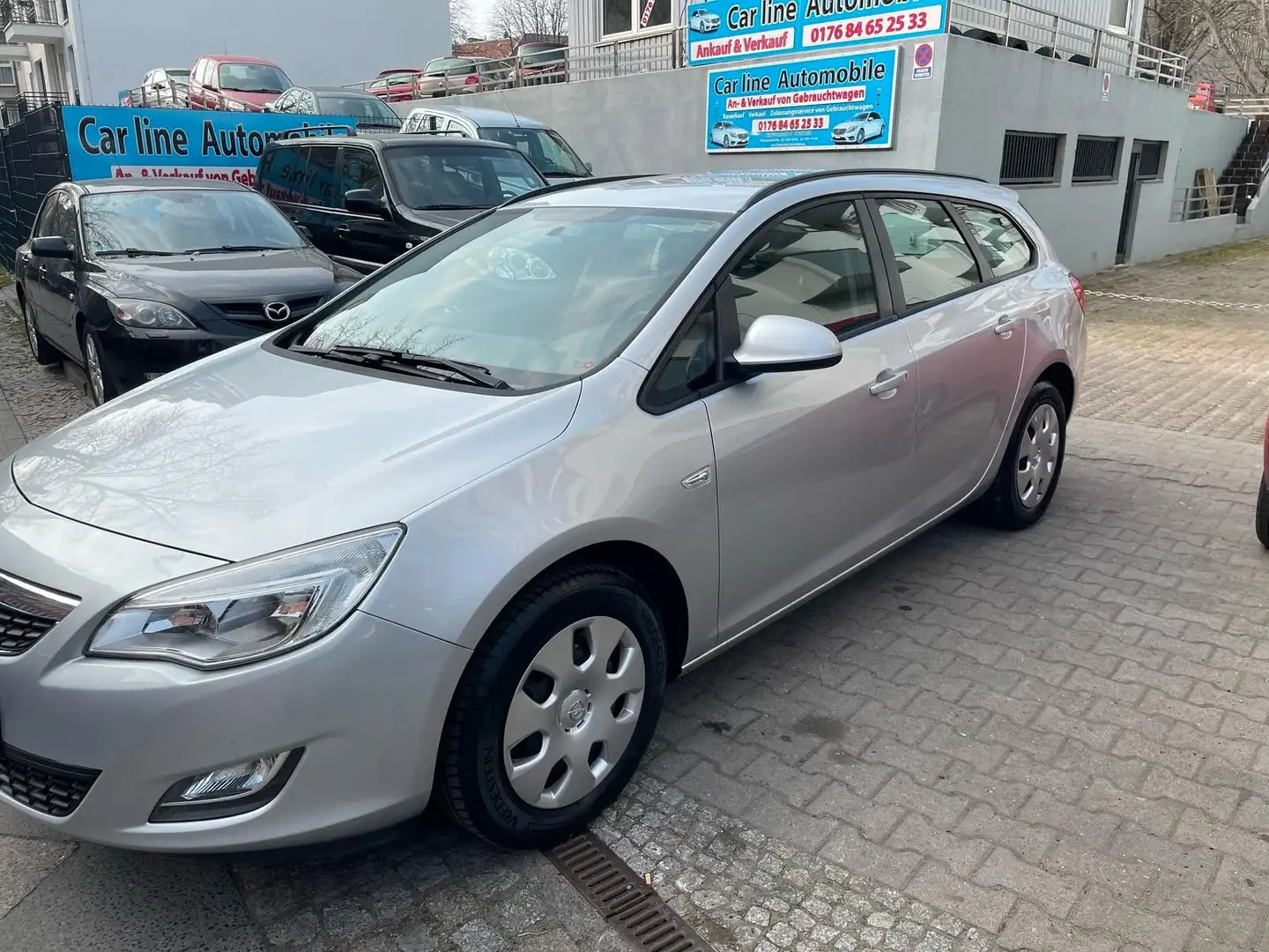 Opel Astra J Sports Tourer Selecti/TÜV NEU/Garantie24 Silber - 2