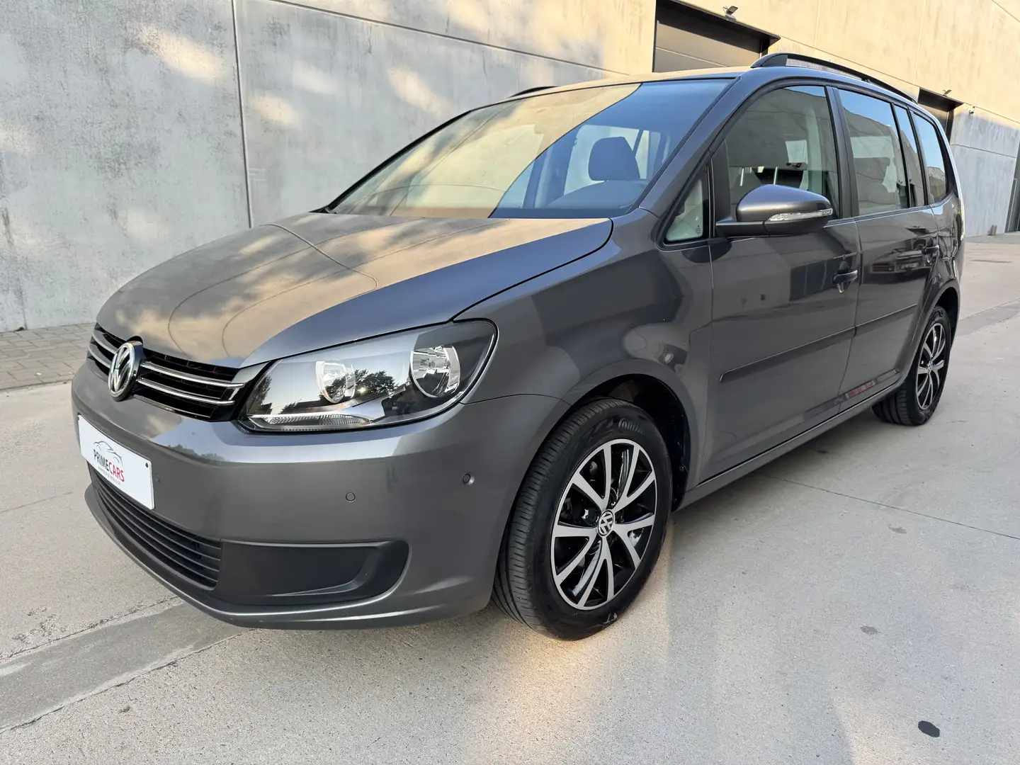 Volkswagen Touran 1.4 TSI Trendline 7pl *12 Maanden Garantie* Gris - 1