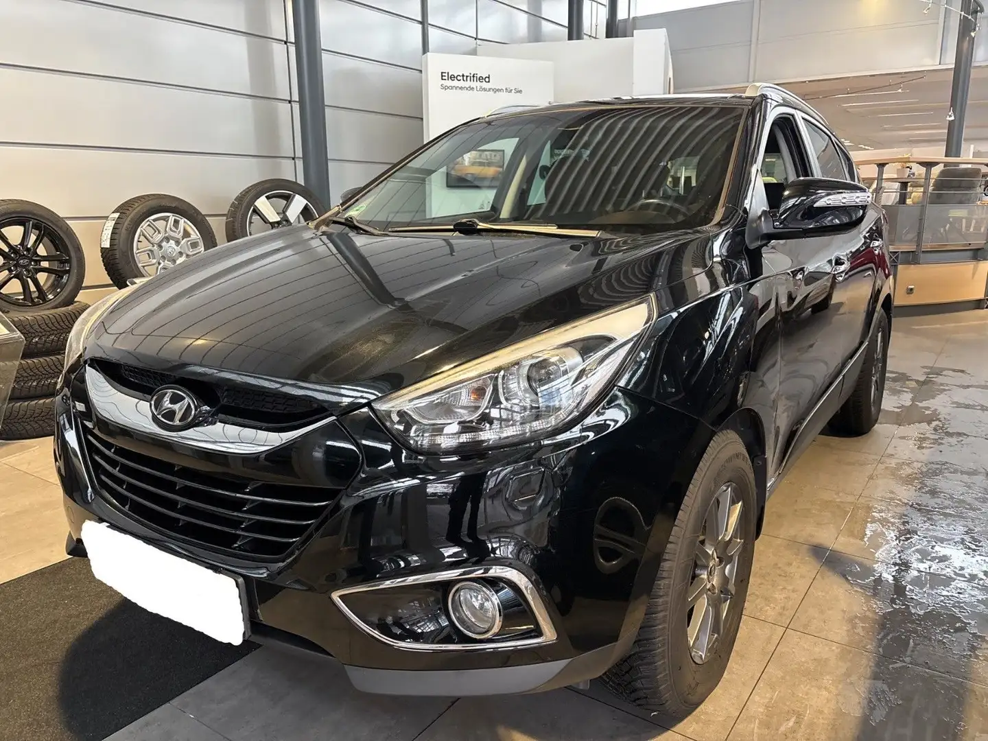 Hyundai iX35 2.0 GDI Comfort/Voll Leder/AHK/Bi Xenon/Kam Schwarz - 1