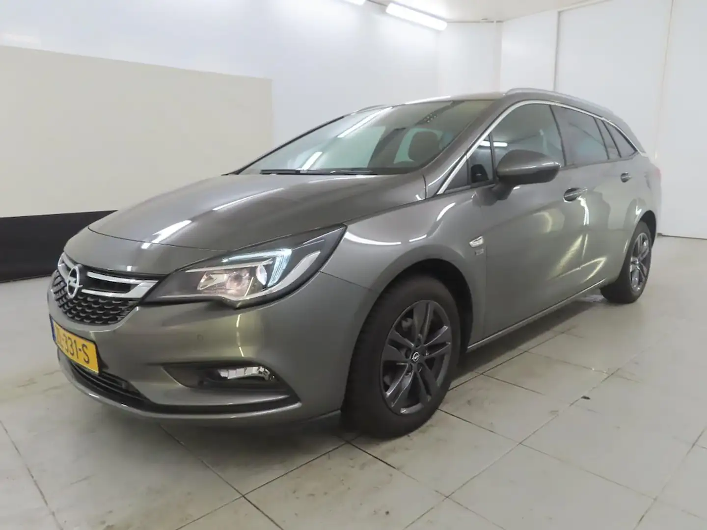 Opel Astra Sports Tourer 1.0 TURBO NAVIGATIE L.M. VELGEN BLUE Grijs - 1