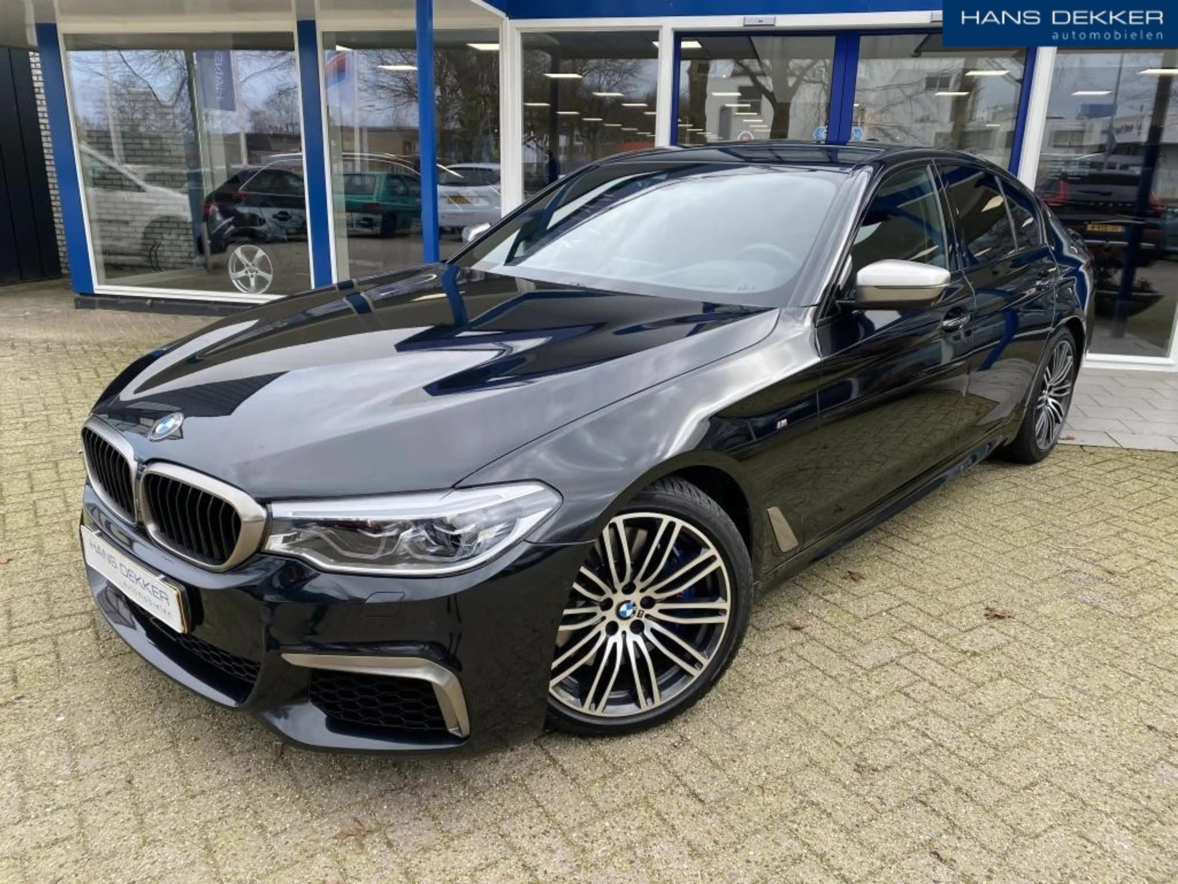 BMW M550 5 Serie M550i xDrive High Executive leer/navigatie