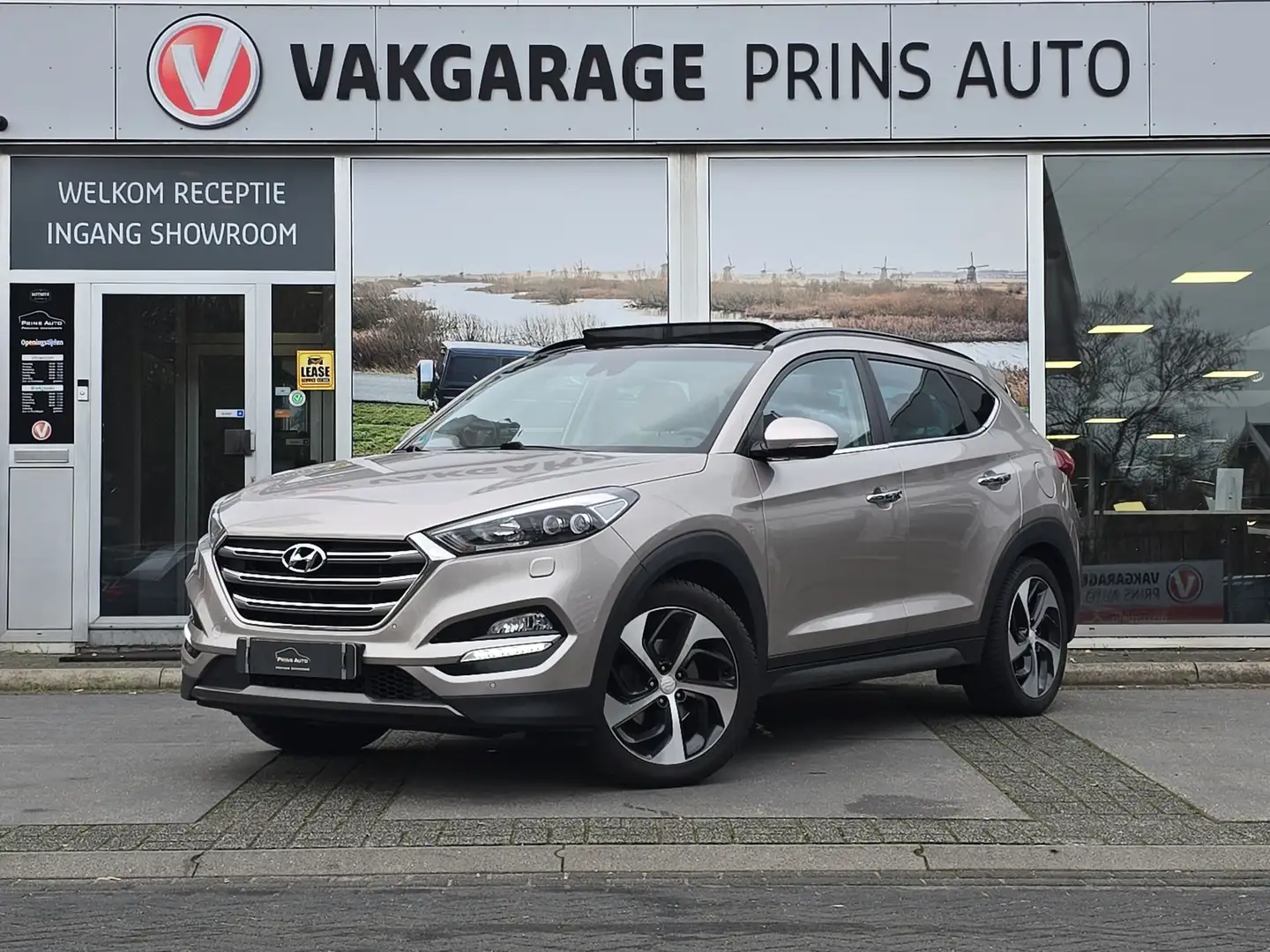 Hyundai TUCSON 2.0 CRDi Premium |PANO|TREKHAAK|STUUR+STOELVERW./K Grijs - 1