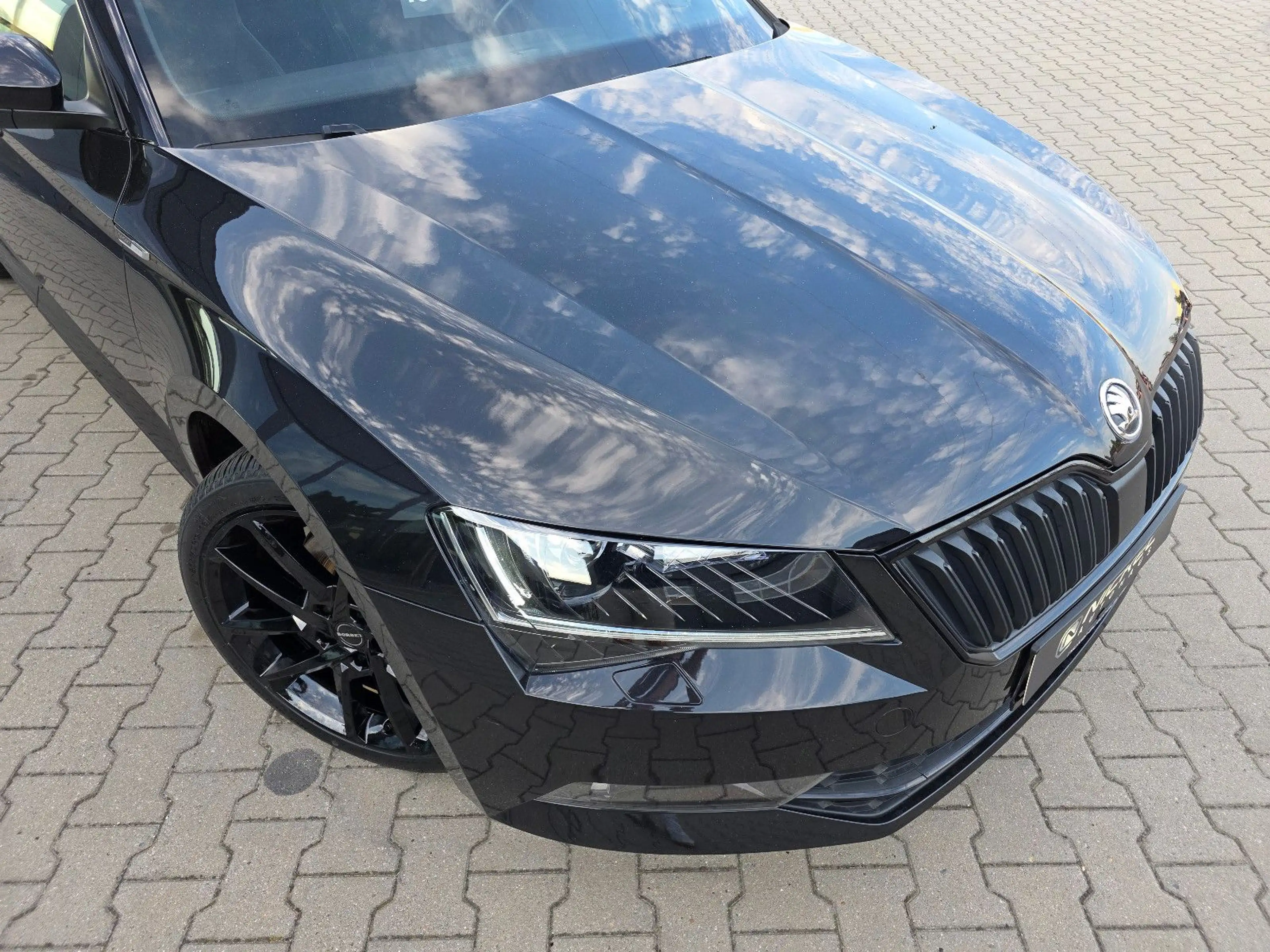 Skoda Superb Combi — photo 11