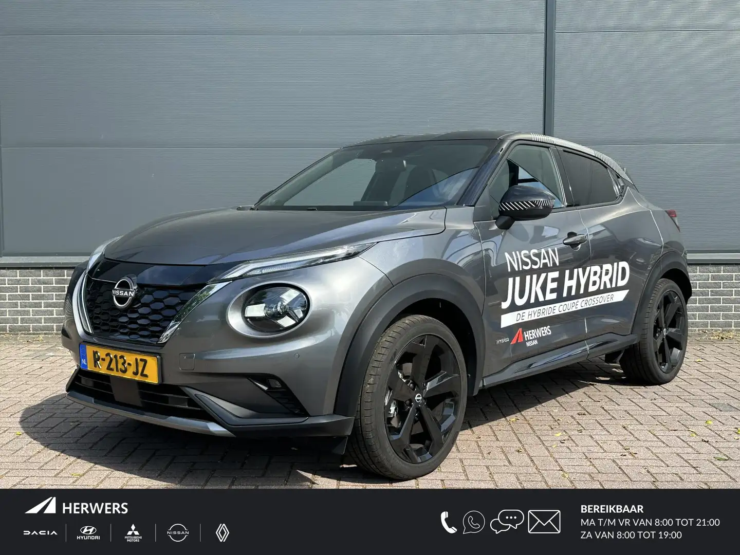 Nissan Juke 1.6 Hybrid Premiere Edition / Airco / Bluetooth / Grijs - 1