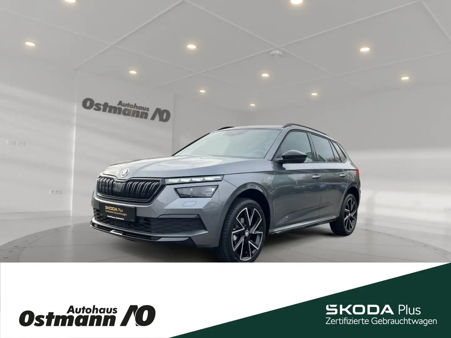 Skoda Kamiq Monte Carlo 81kw TSI *SHZ*LED*PDC*NAVI*RFK* Grijs - 1