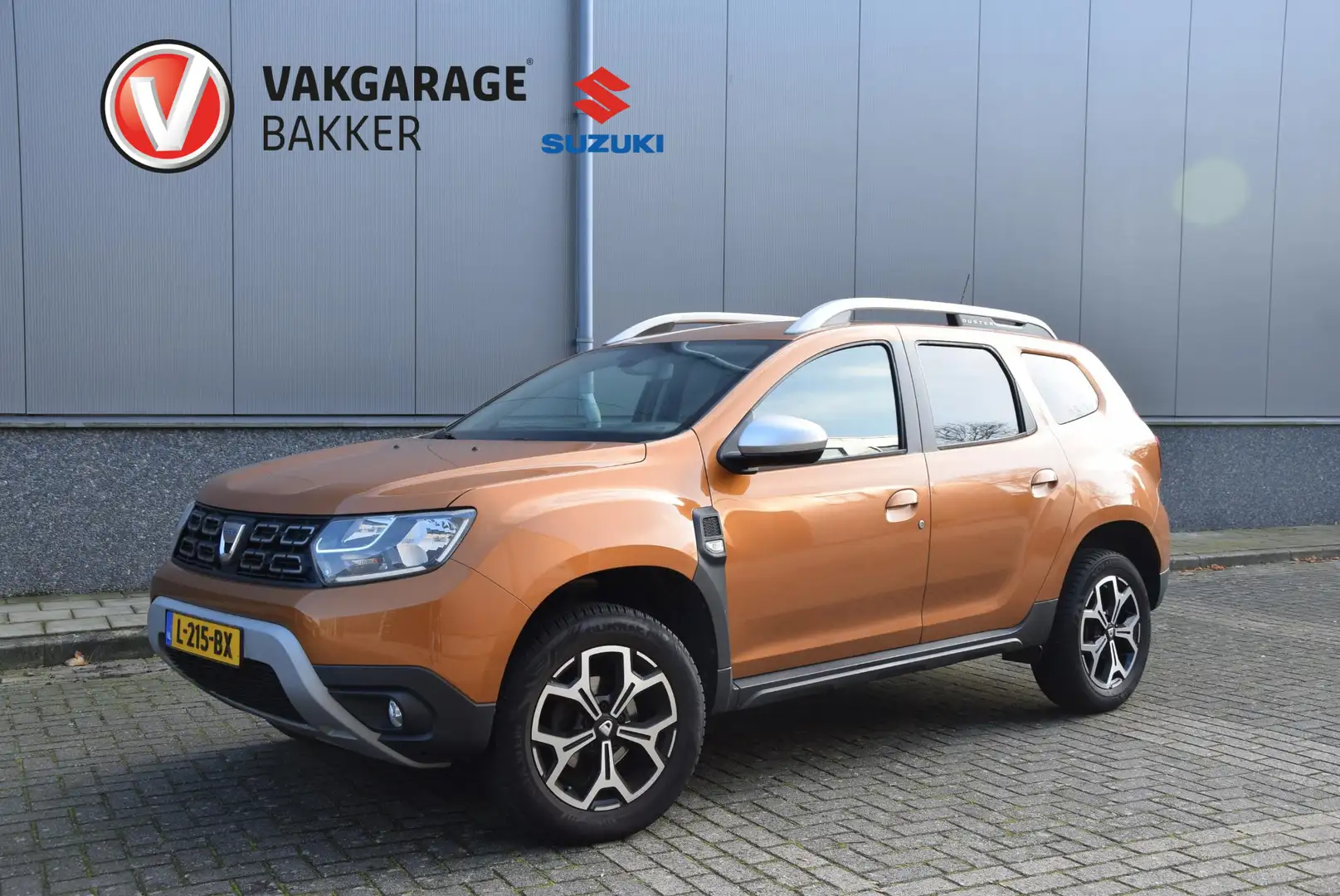Dacia Duster 1.2 TCe Prestige | Volledig onderhouden | 1e eigen Orange - 1